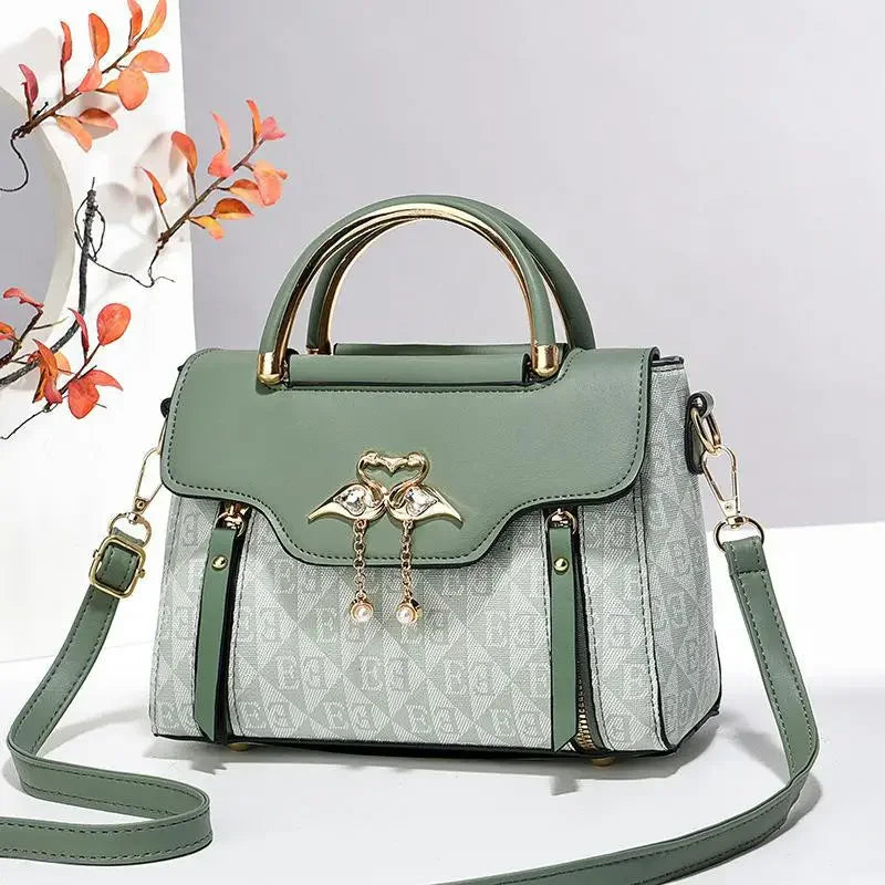 Borsa da donna 2026 nuova tendenza della moda borsa a tracolla casual versatile in stile semplice in rilievo.