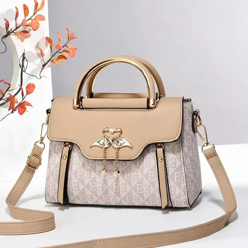 Borsa da donna 2026 nuova tendenza della moda borsa a tracolla casual versatile in stile semplice in rilievo.