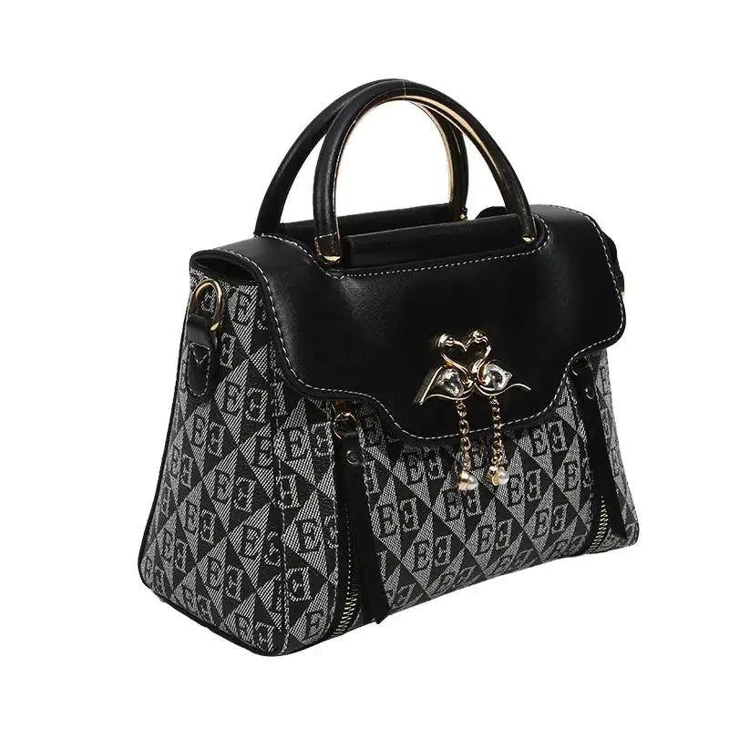 Borsa da donna 2026 nuova tendenza della moda borsa a tracolla casual versatile in stile semplice in rilievo.