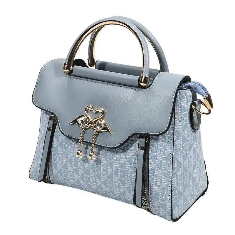 Borsa da donna 2026 nuova tendenza della moda borsa a tracolla casual versatile in stile semplice in rilievo.