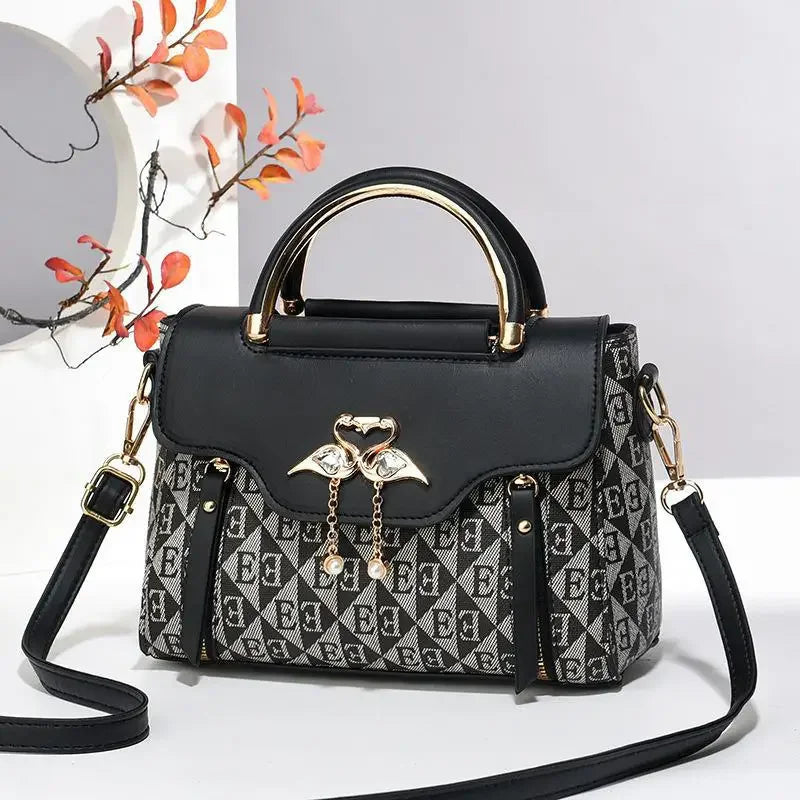 Borsa da donna 2026 nuova tendenza della moda borsa a tracolla casual versatile in stile semplice in rilievo.