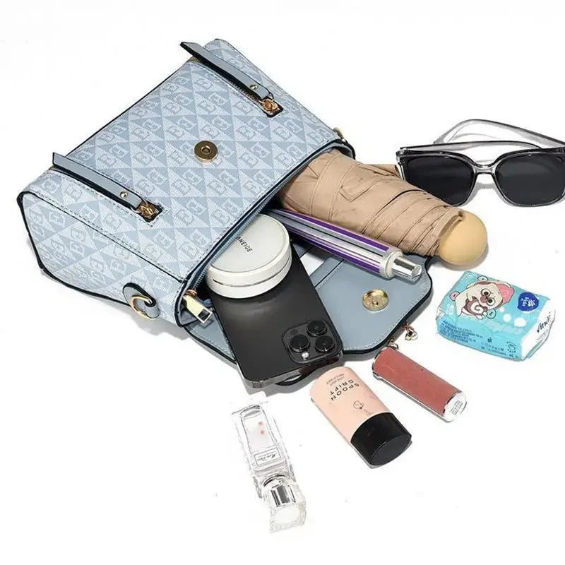 Borsa da donna 2026 nuova tendenza della moda borsa a tracolla casual versatile in stile semplice in rilievo.