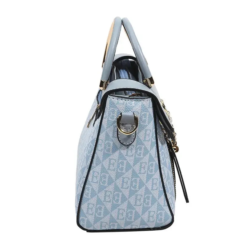 Borsa da donna 2026 nuova tendenza della moda borsa a tracolla casual versatile in stile semplice in rilievo.