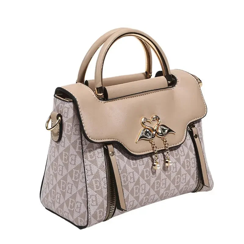 Borsa da donna 2026 nuova tendenza della moda borsa a tracolla casual versatile in stile semplice in rilievo.