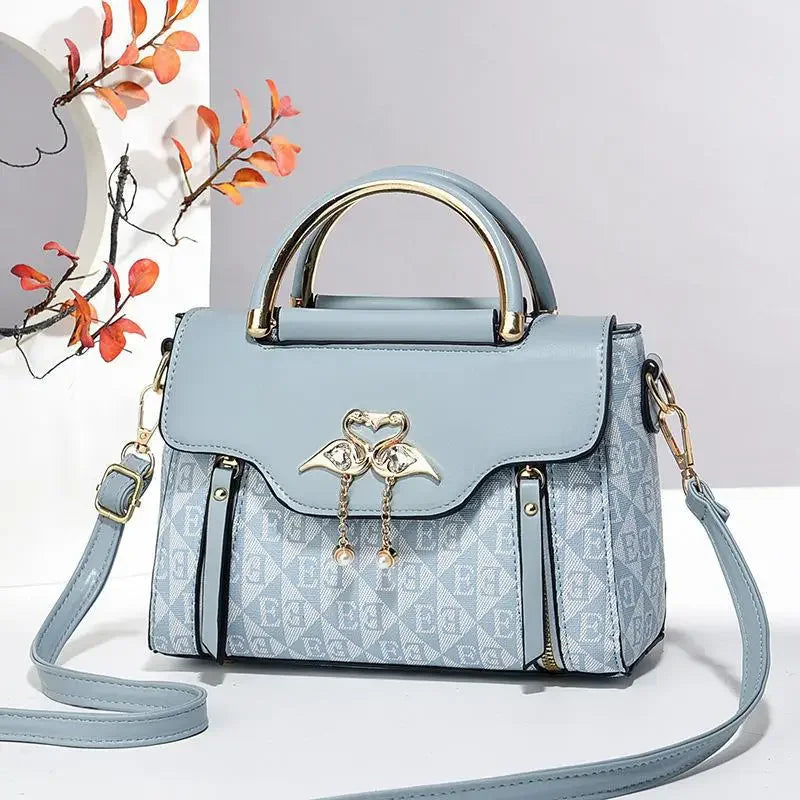 Borsa da donna 2026 nuova tendenza della moda borsa a tracolla casual versatile in stile semplice in rilievo.