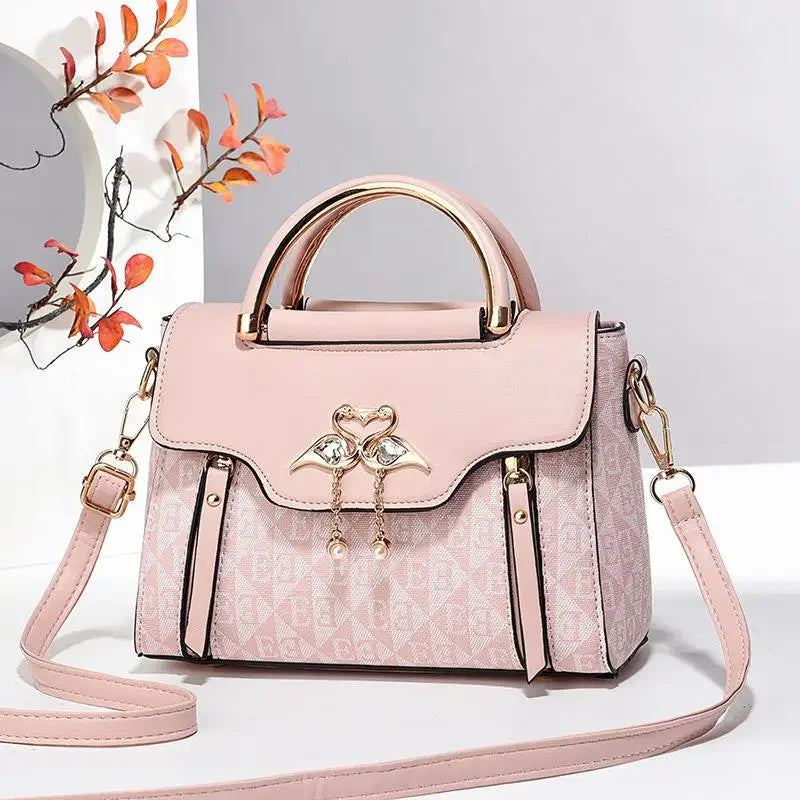 Borsa da donna 2026 nuova tendenza della moda borsa a tracolla casual versatile in stile semplice in rilievo.